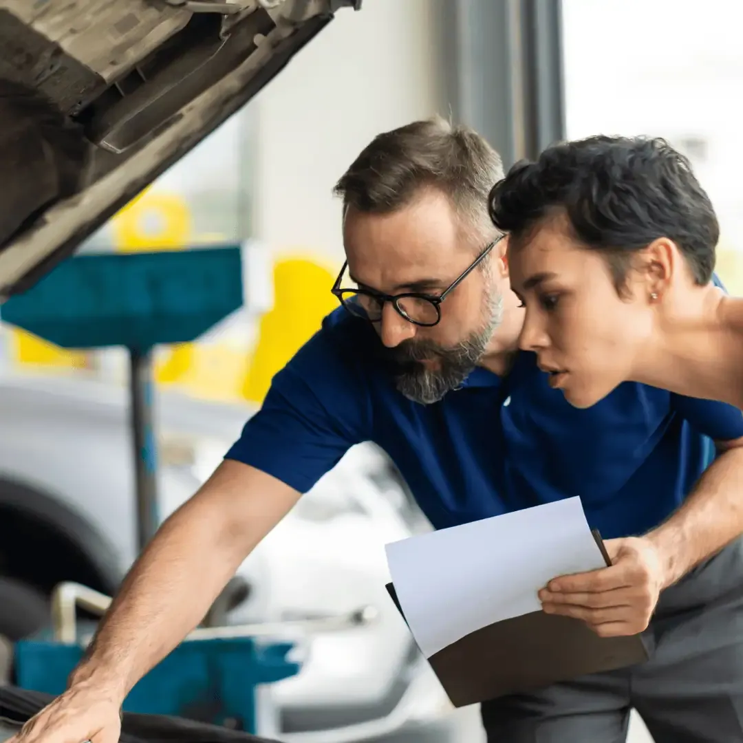 Used car inspection showing engine bay check
